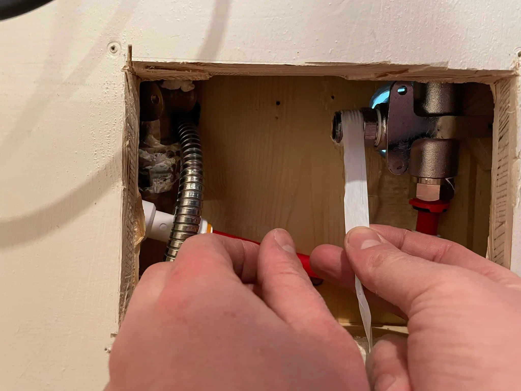 control hole for camper shower plumbing pipes