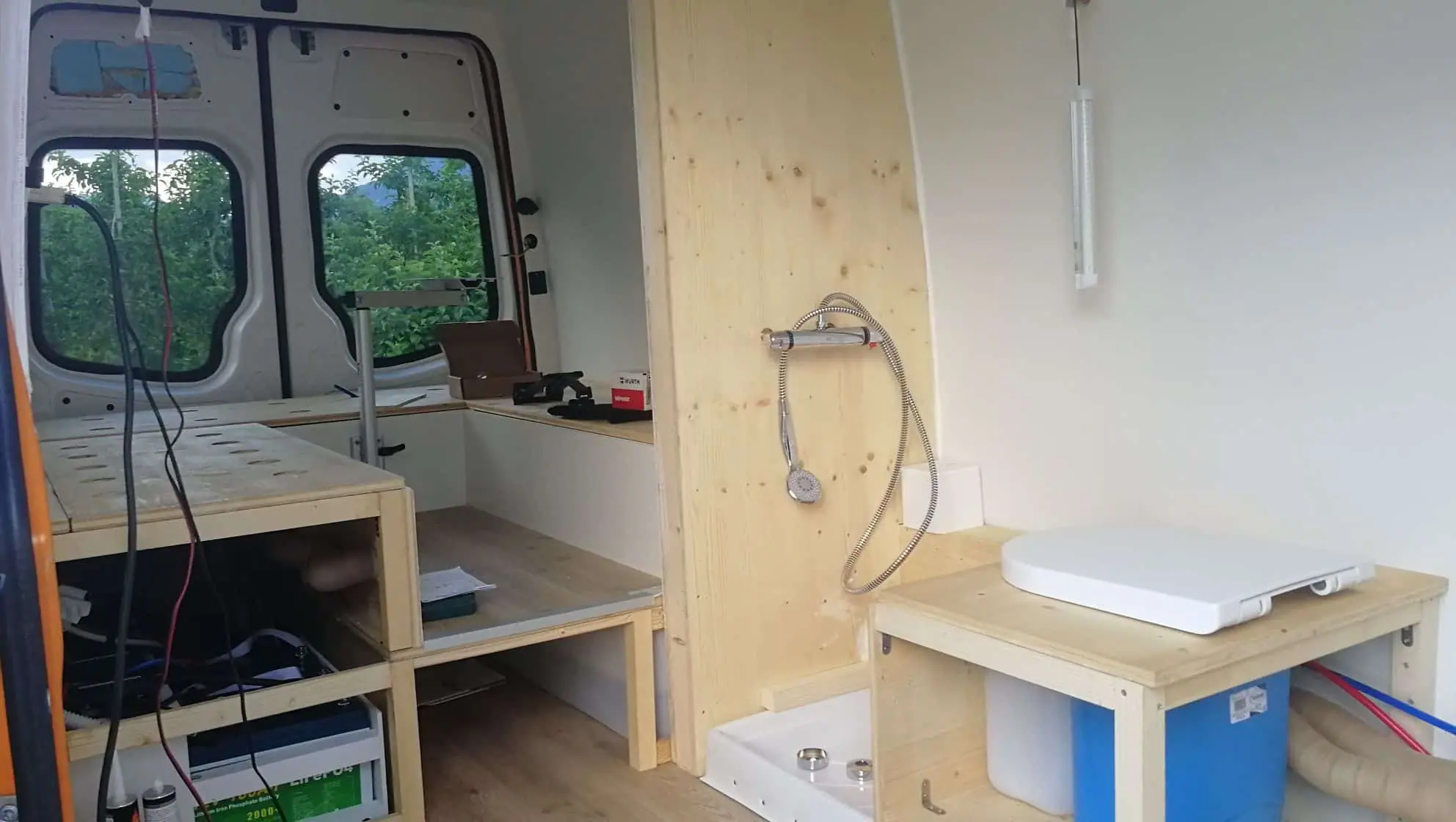 van conversion - shower prototype DIY near bed